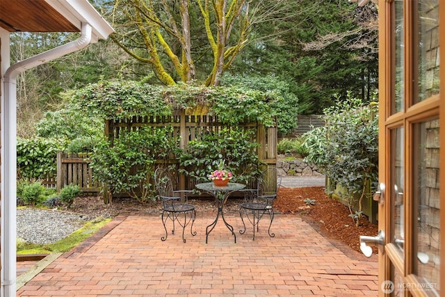 view of patio with fence