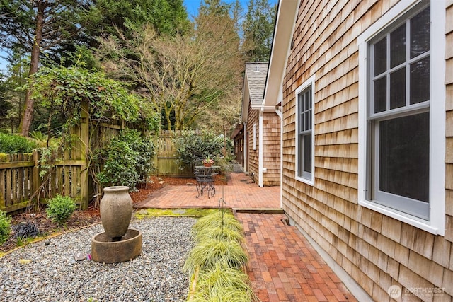 view of yard featuring a patio area and fence