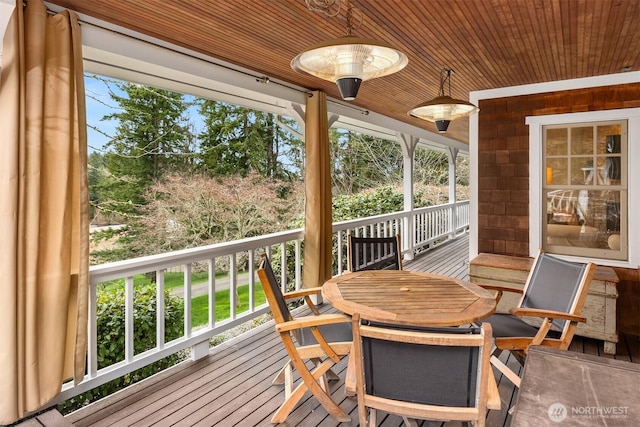 sunroom / solarium with wooden ceiling