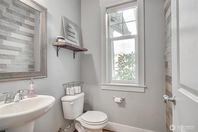bathroom with a sink and toilet