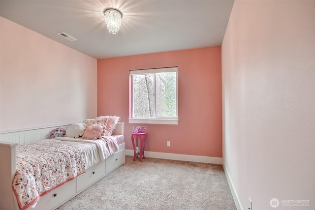 carpeted bedroom with baseboards and visible vents
