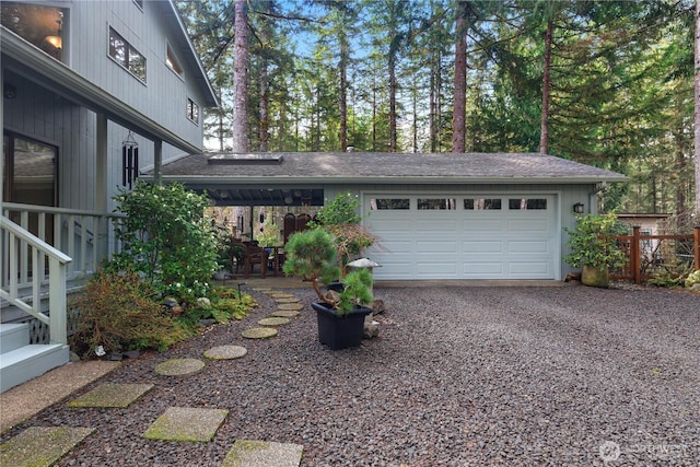 exterior space with gravel driveway