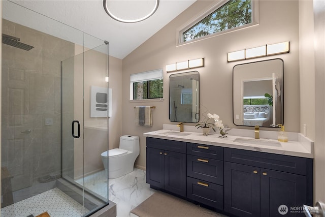 full bathroom featuring marble finish floor, a stall shower, lofted ceiling, and a sink