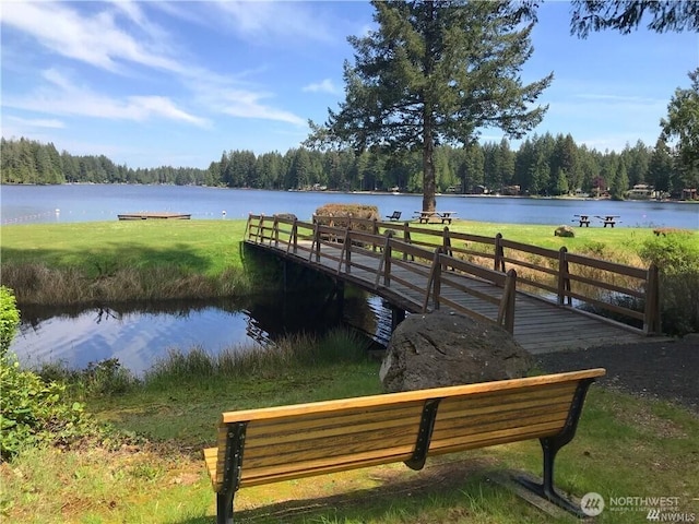 view of dock with a water view