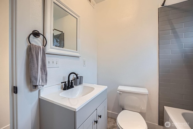 full bathroom with toilet and vanity