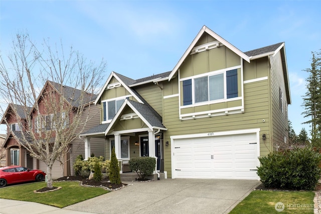 craftsman-style home with a garage, concrete driveway, board and batten siding, and roof with shingles