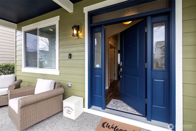 entrance to property with a porch