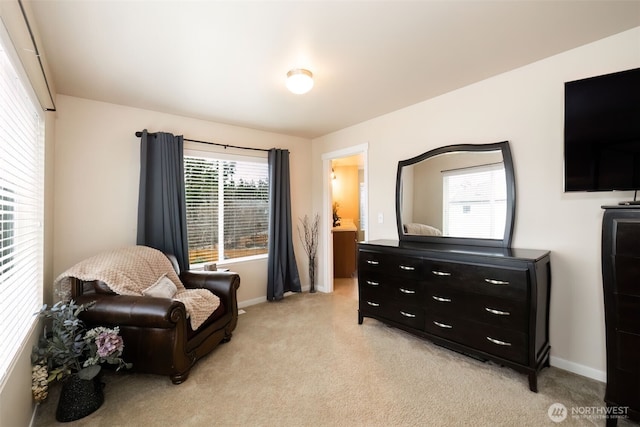 sitting room with light carpet and baseboards