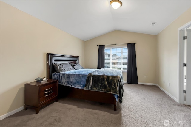 bedroom with carpet floors, baseboards, visible vents, and vaulted ceiling