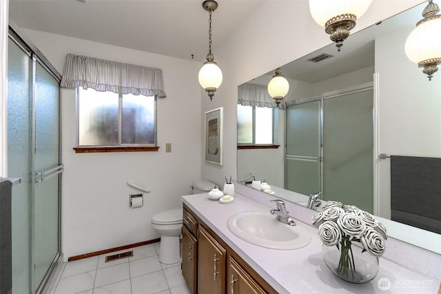 full bath with visible vents, toilet, a shower stall, and vanity