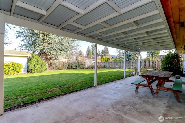 view of patio featuring outdoor dining space and a fenced backyard