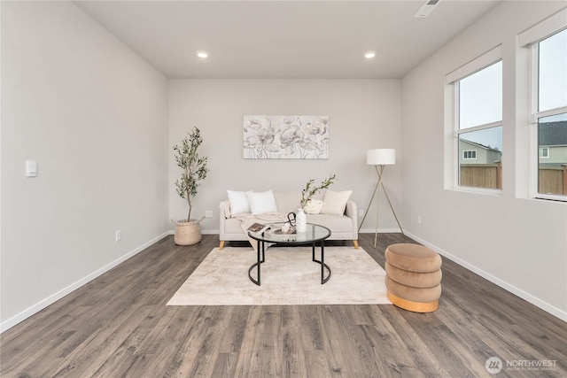 sitting room featuring recessed lighting, baseboards, and wood finished floors