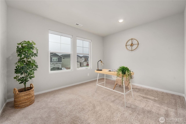 carpeted office space with recessed lighting, baseboards, and visible vents