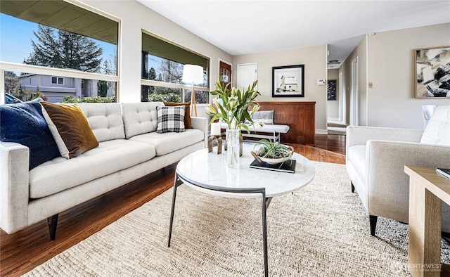 living area with wood finished floors