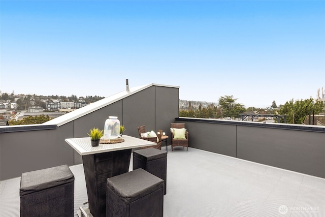 view of patio with a balcony