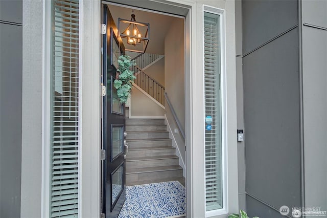 property entrance with brick siding