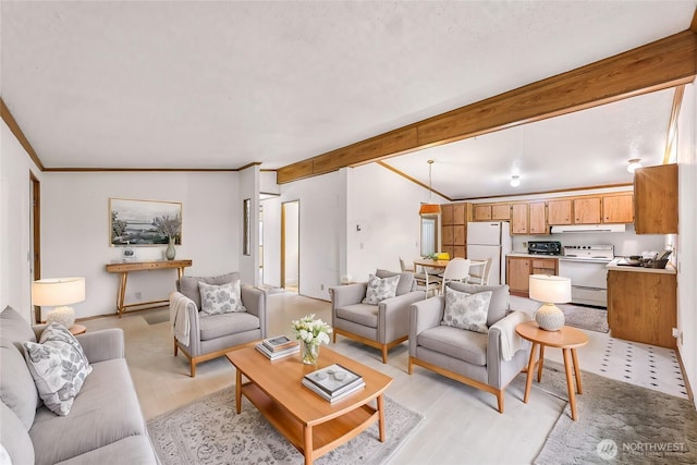 living room featuring vaulted ceiling with beams, light wood-style floors, and crown molding