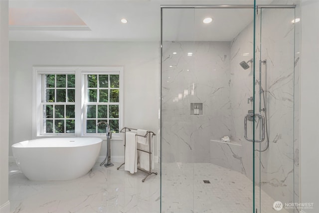 full bath with recessed lighting, marble finish floor, a freestanding bath, and a marble finish shower