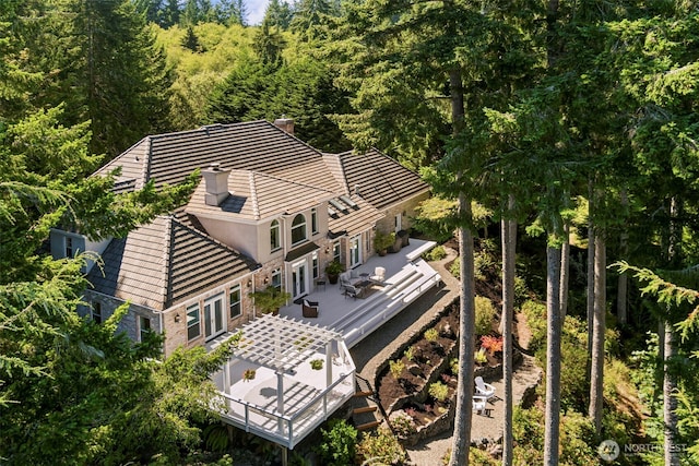 aerial view featuring a forest view