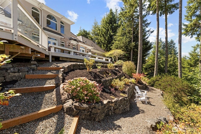 view of yard featuring a deck