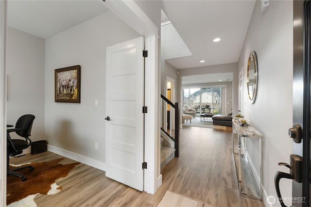 office area featuring recessed lighting, baseboards, and light wood finished floors