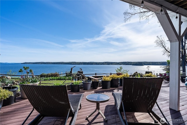 deck featuring a water view