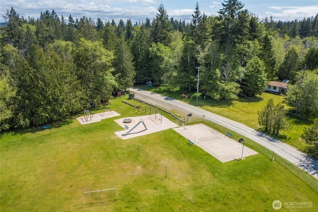 aerial view with a wooded view