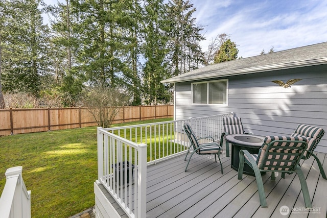 deck with fence and a yard