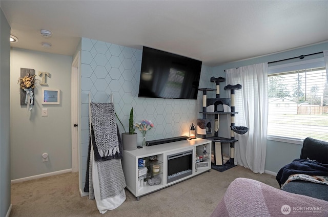 10103 Kline St SW, Lakewood, WA 98499 - living room with light carpet, an accent wall, and baseboards