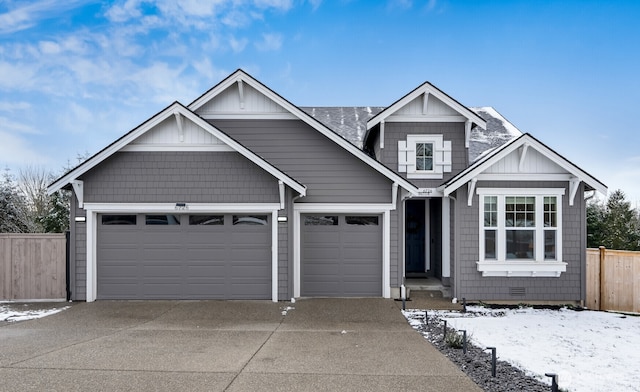 view of front of home featuring a garage, a shingled roof, fence, driveway, and crawl space