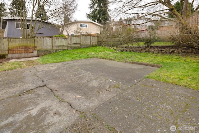 view of patio featuring fence