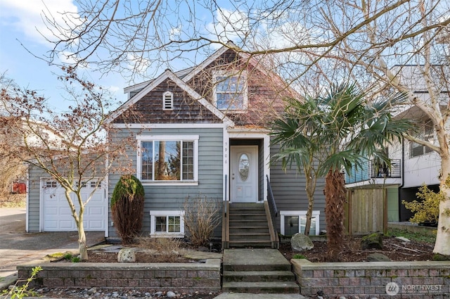 view of front facade with driveway and an attached garage