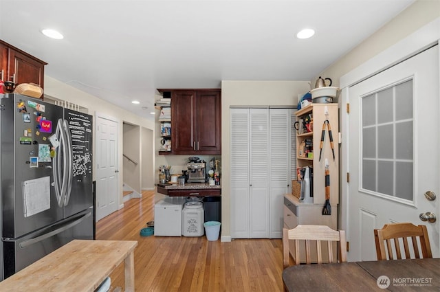 kitchen with light wood-style floors, freestanding refrigerator, recessed lighting, and open shelves