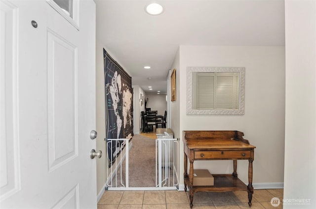 entrance foyer featuring recessed lighting, baseboards, and tile patterned floors