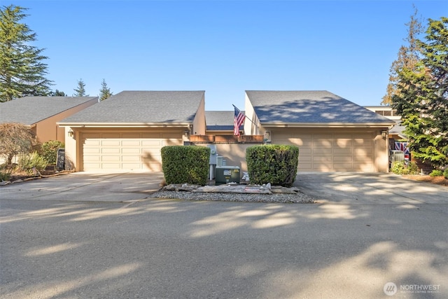 view of front of house featuring driveway and an attached garage