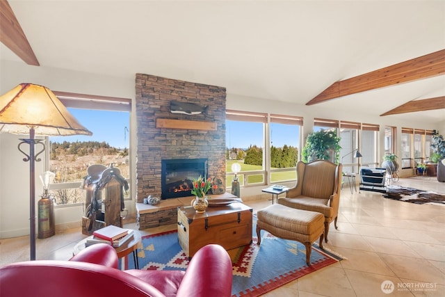 living room featuring tile patterned flooring, a stone fireplace, and lofted ceiling with beams