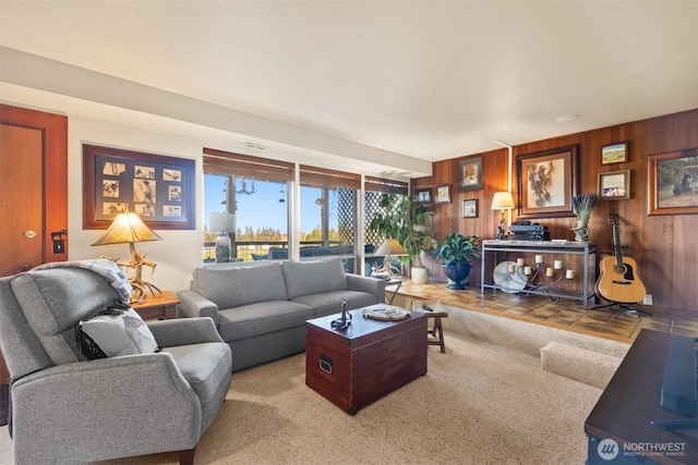 living room featuring wood walls