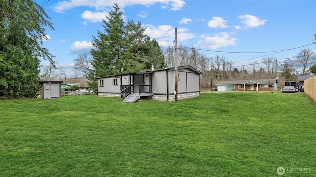 view of yard with a storage shed and an outdoor structure