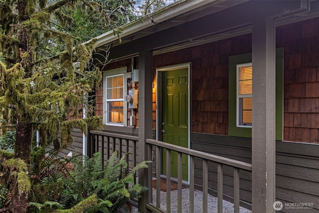 view of side of property featuring a porch