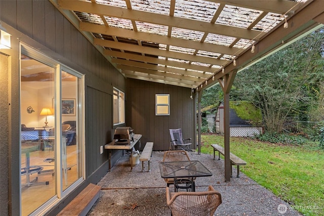 view of patio featuring a pergola