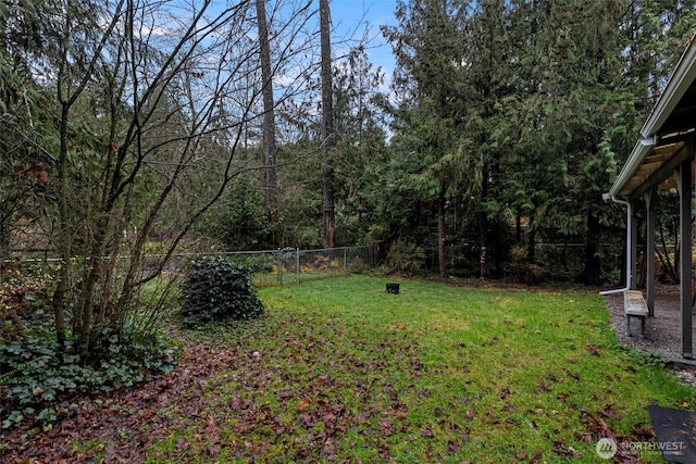 view of yard featuring fence