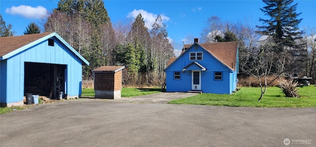 exterior space featuring an outbuilding