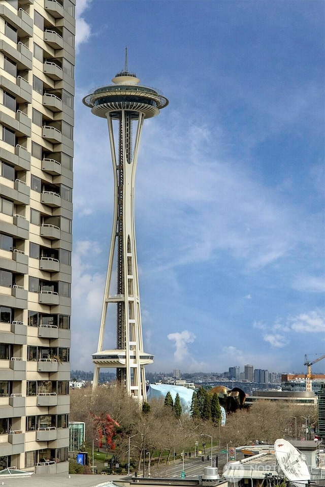 view of property featuring a view of city and a water view