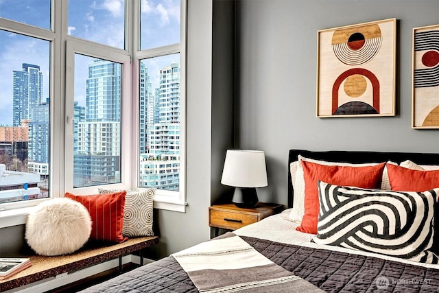 bedroom with a city view