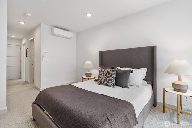 carpeted bedroom featuring recessed lighting, an AC wall unit, and baseboards