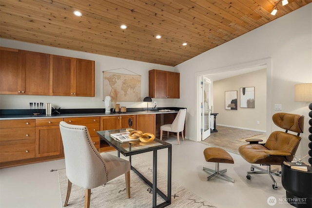 kitchen featuring lofted ceiling, concrete floors, wooden ceiling, and recessed lighting