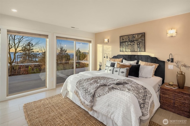 bedroom featuring access to outside and recessed lighting