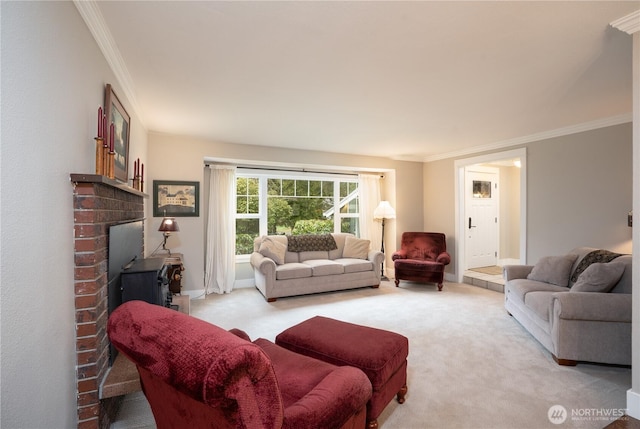 living area with baseboards, ornamental molding, and carpet flooring