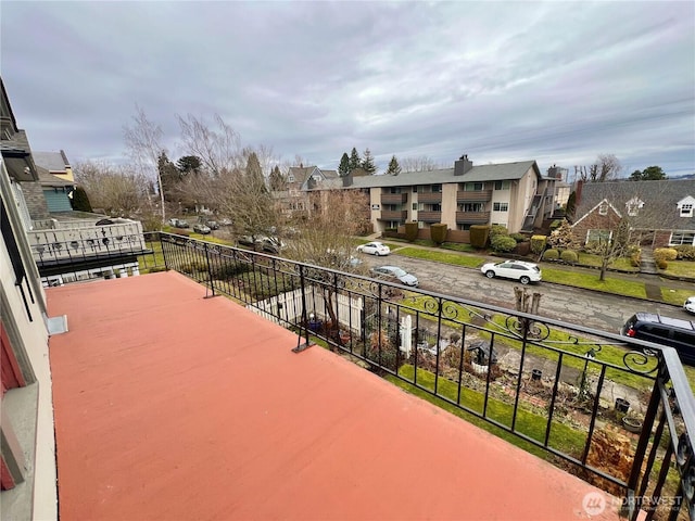 balcony featuring a residential view