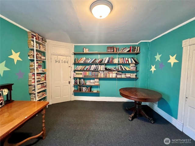 interior space featuring ornamental molding and baseboards